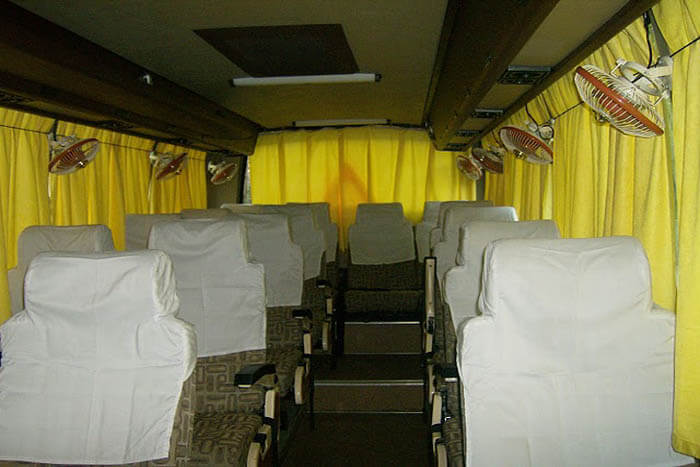 18 seater bus on rent